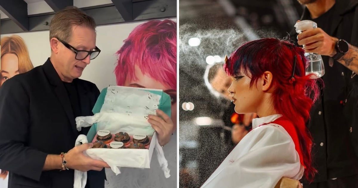 A model at Salon International has been styled with a vibrant red choppy mullet
